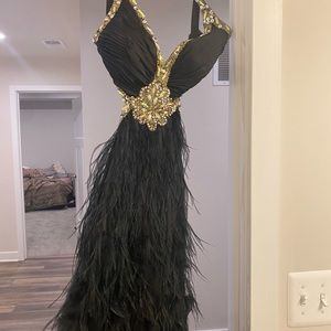 Black Prom dress with split on the left side.